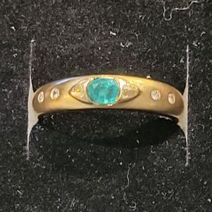 Emerald and diamond eye ring